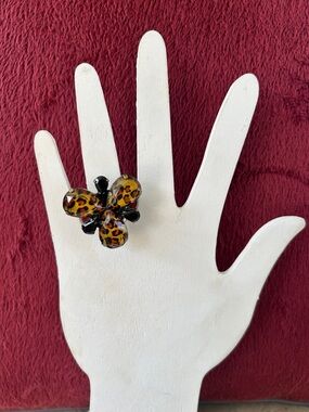 Avon Adjustable Animal Print Flower Statement Ring Burnished Brass Band size 7